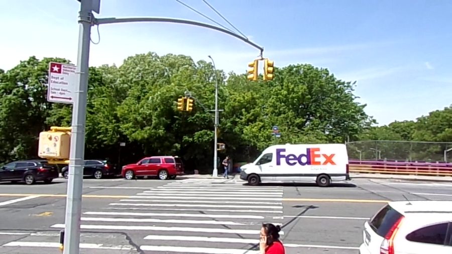 A FedEx van ran  a red light  in the main crosswalk in front of the school on the afternoon of May 27. During the 30-minute observation that afternoon, nine vehicles, including a  a city bus, ran the light.