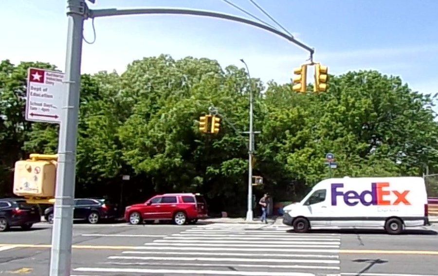 A Federal Express van ran  a red light  in the main crosswalk in front of the school on the afternoon of May 27. During the 30-minute observation that afternoon, nine vehicles, including a school bus and a city bus, ran the light.