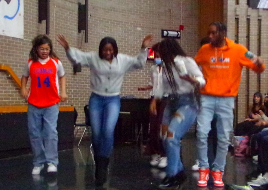 Students and staff show off their dance routines at the December Town Hall.