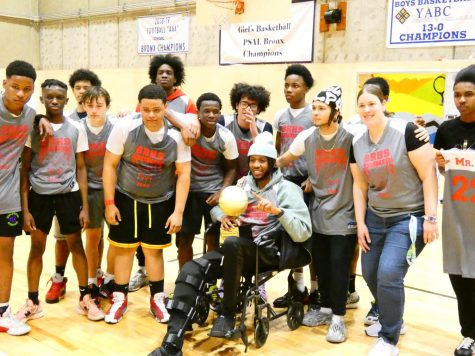 Juniors celebrate the win in a tournament that honored David Ollivierre, a favorite teacher who died unexpectedly last March. 