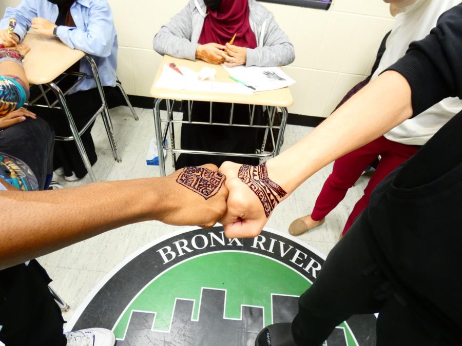 Student council celebrated the end of Eid by giving students Henna tattoos. 