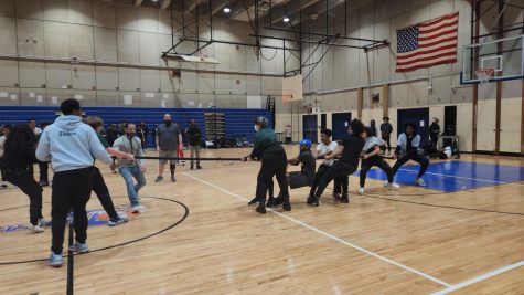 Freshmen work hard to win the game of Tug of War.
