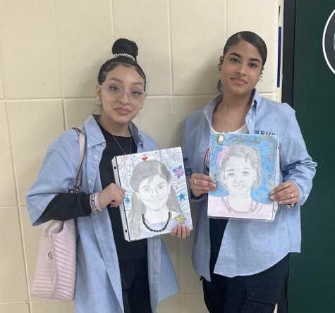 Kelly Ramirez and Nikouli Liranzo display the portraits they created for children in India. 