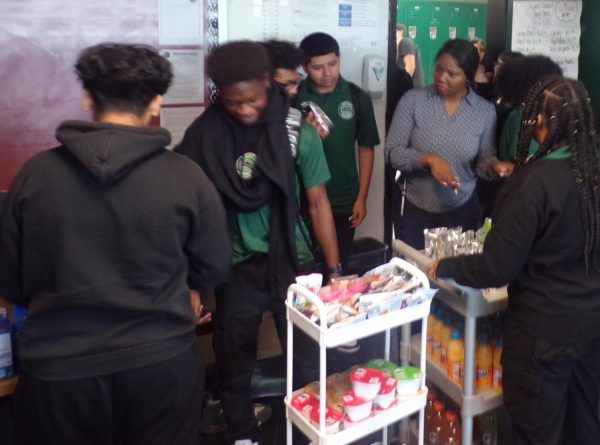 Students line up for snacks sold by the Student Council during lunch. 
