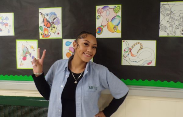 Hazel Ramos, the schools artist of the month, enjoys working with pencils and paint. 