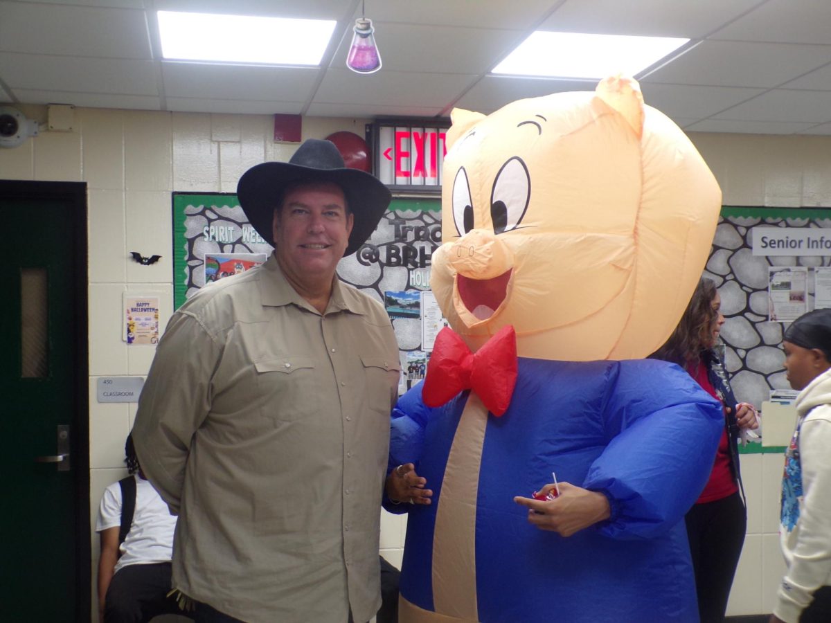 Greg Fucheck as the cowboy standing next to porky.