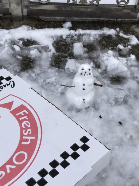 Snow day in the Bronx: In between online classes, students enjoyed the snow and pizza. 