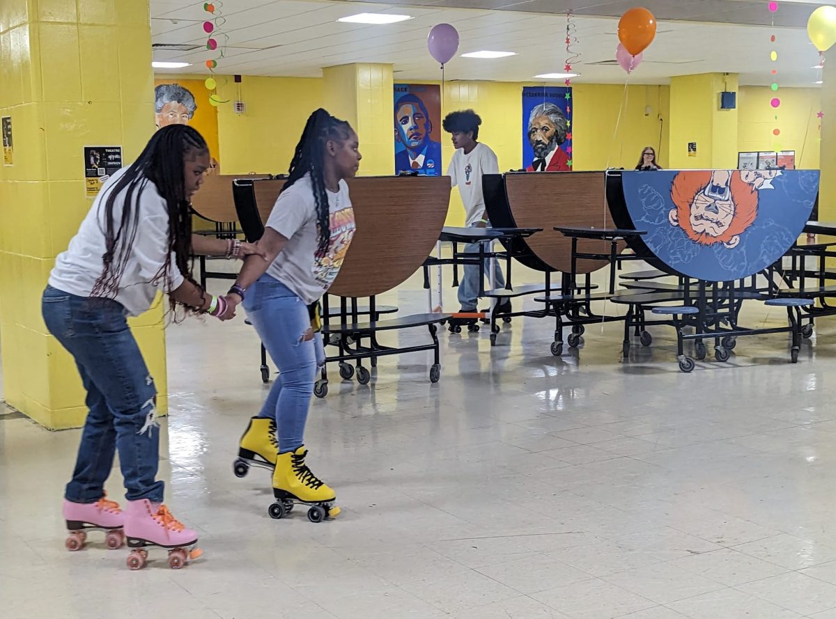 Students helped each other out as they developed their skating skills.