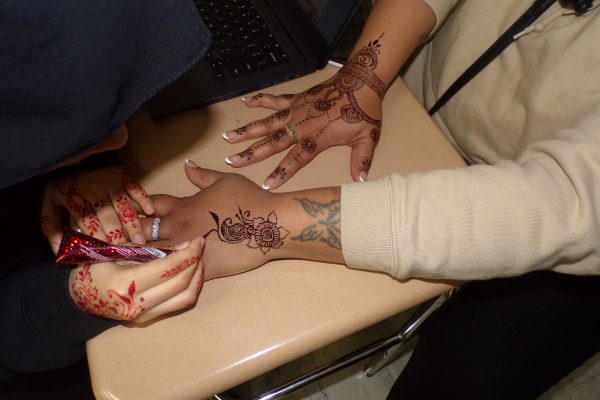 Students and staff signed up for Henna Tattoos as part of a Student Council event.