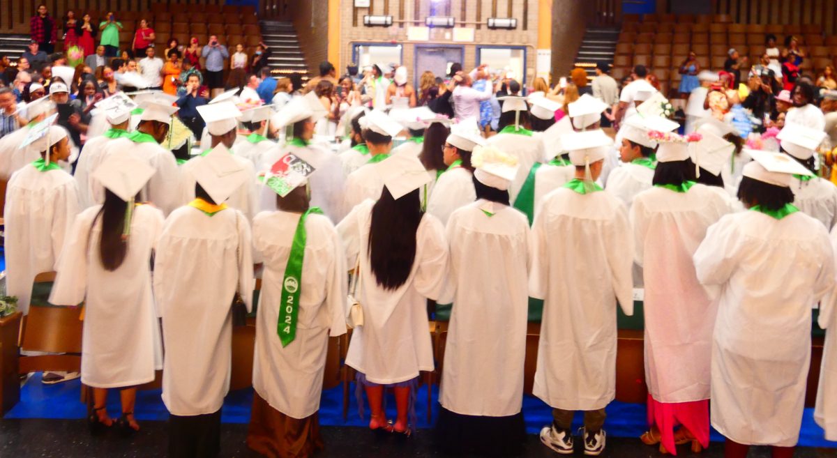 Class of 2024 looks toward family and friends after the gradation ceremony concluded on June 25.