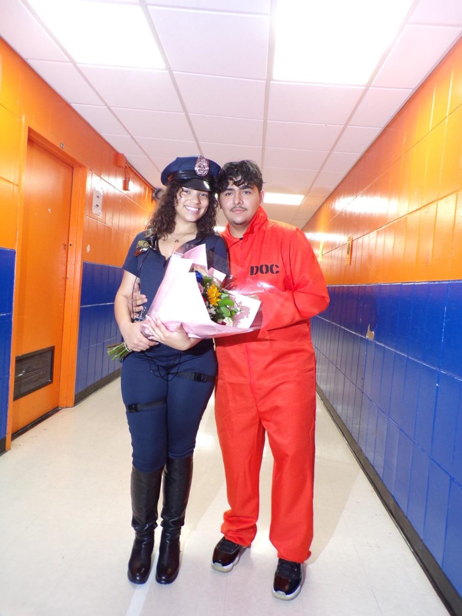 Alexa Figueroa, a sophomore, dressed up as a female cop for Halloween. Her boyfriend, Oscar Juarez, dressed as a prisoner to match her costume. 