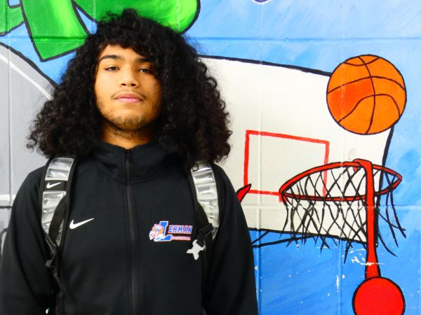 Junior Jose Figueroa plays point guard for the school's varsity basketball team.
,