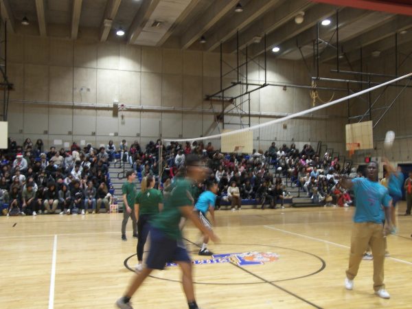 The staff beat the students in the annual volleyball game. 