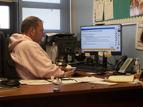 Principal Greg Fucheck takes part in a remote meeting about how to handle requests from non-local law enforcement officials to enter school buildings or seek access to students and their information.