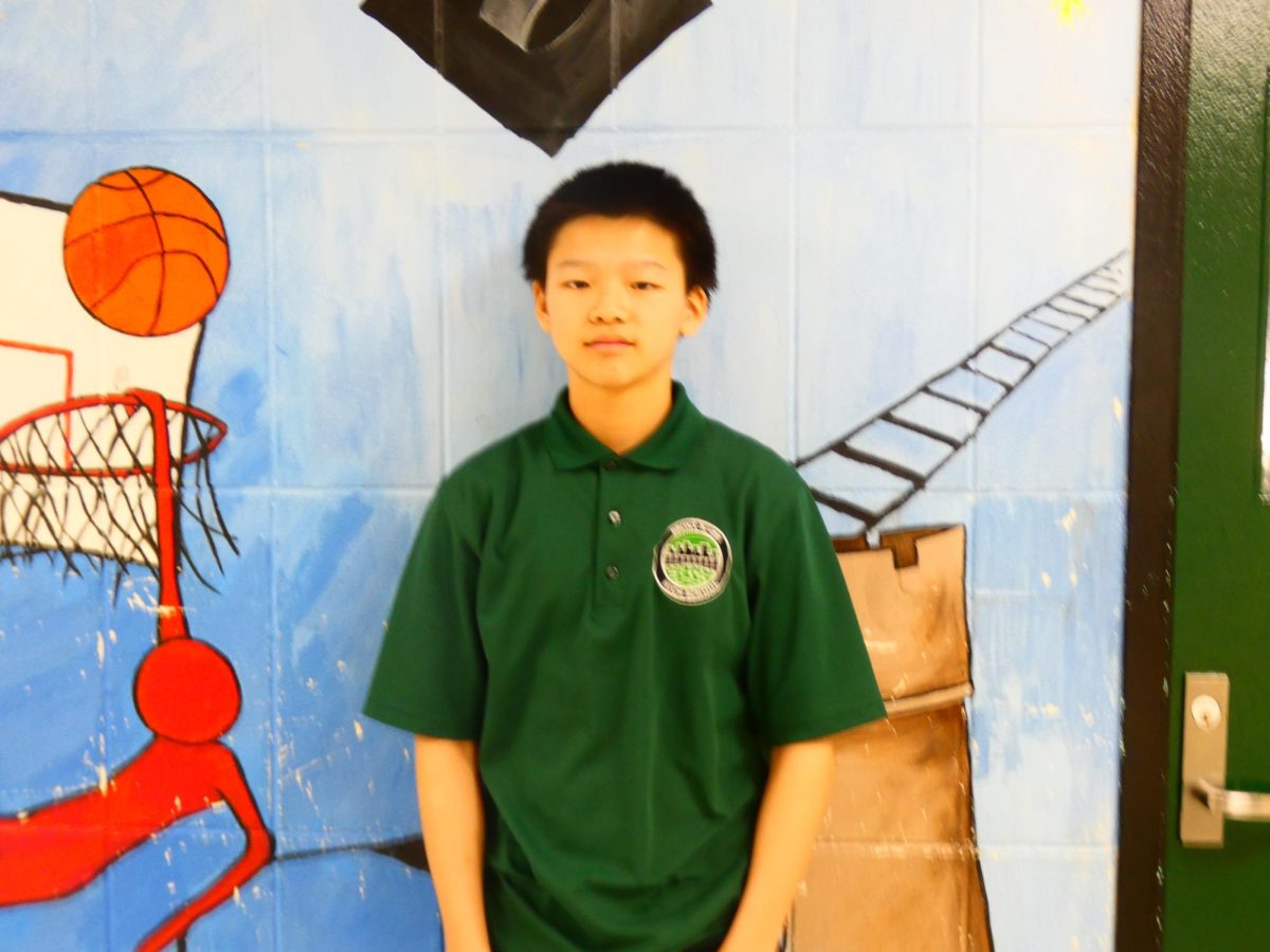 Freshman Justin Zhu plays on the school's junior varsity basketball team.