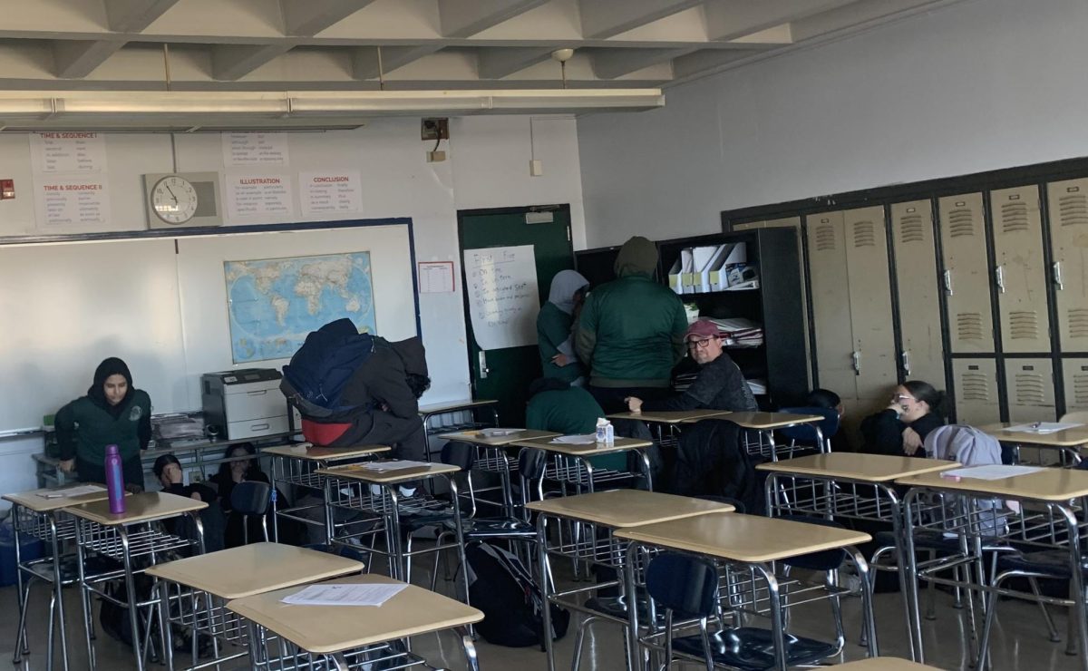 Students in a U.S. History class try to stay quiet and out of sight during a soft lockdown.