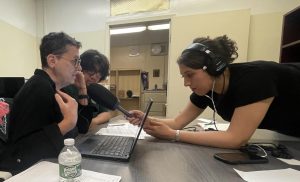 Veronica De Valle, an associate producer for "Morning Edition,'' helps Cesar Jimenez, the editor-in-chief, and Deborah Porterfield, the advisor for Bronx River News, get ready for an interview about finding the right balance between protecting students and their right to free speech.