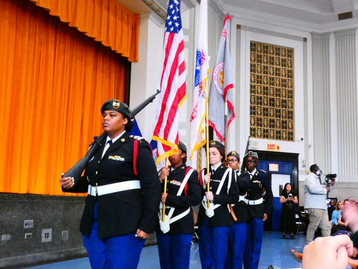 The JROTC Color Guard from Lehman Campus presents the flags during an opening ceremony  at the chancellor's State of the Schools speech. 