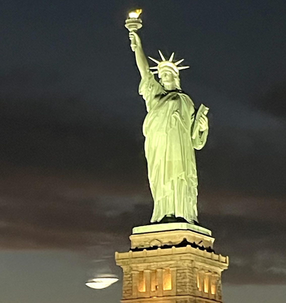 Lady Liberty showing her brightness in the city of New York telling us that we are not alone on our journeys to a better tomorrow.