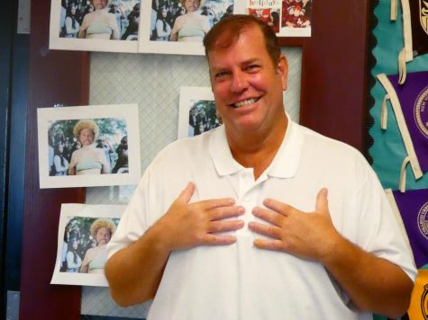 Principal Gregory Fucheck, who announced his retirement this school year, is known for building good relationships with students. Above, he good-naturedly poses with a senior prank that spoofed him with AI-generated photos. 