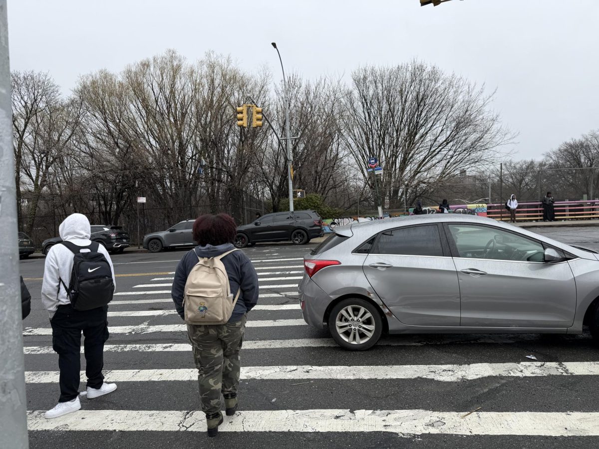 At crosswalks in front of the Lehman Campus, walk signals sometimes feel more like suggestions than rules, making teachers and students wary. 