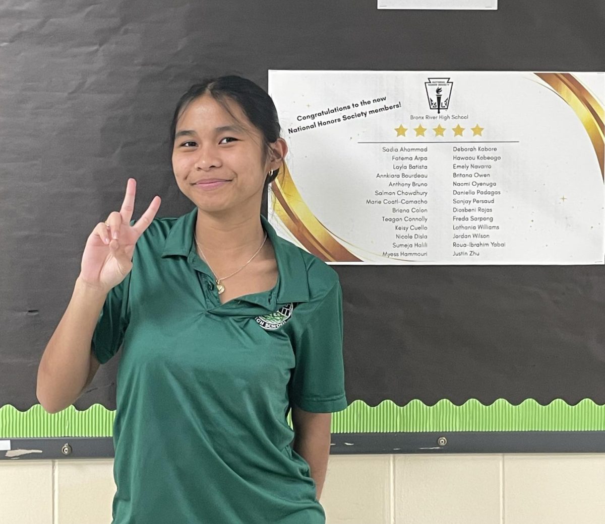 Daniella Padagas a junior, celebrates her selection in the National Honor Society.