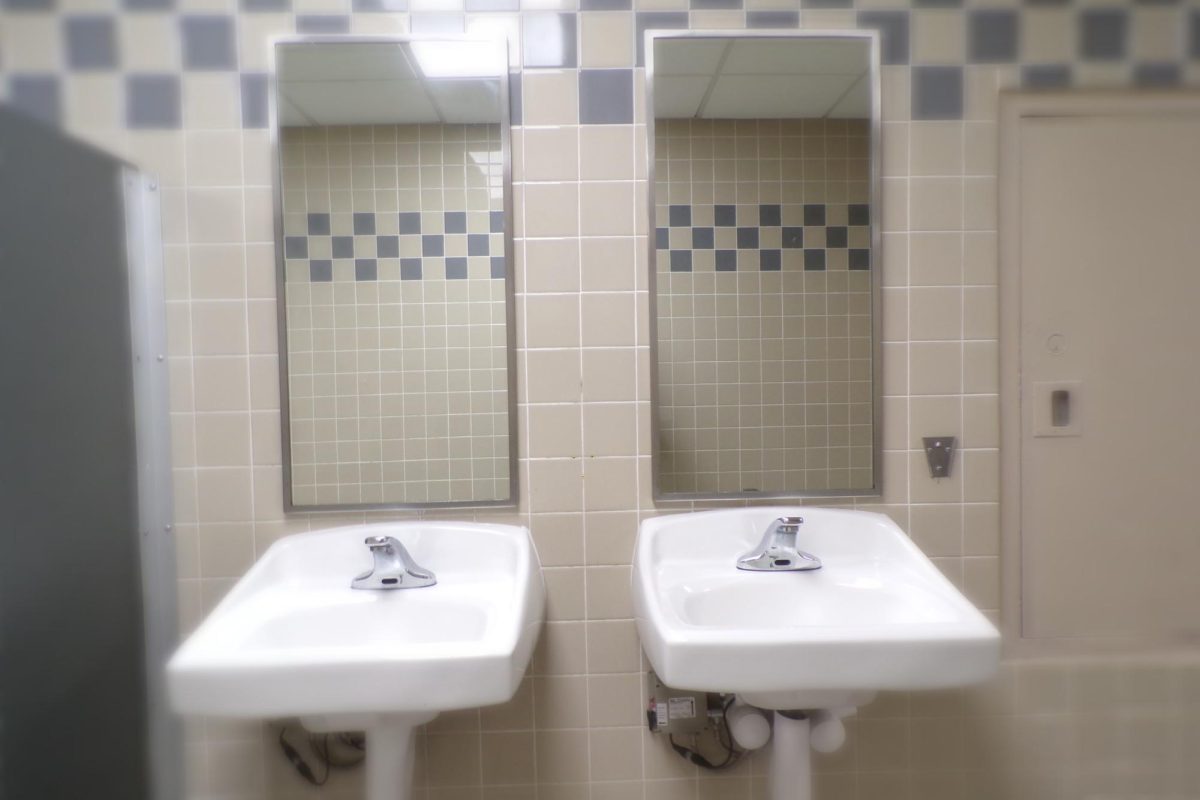 Students and staff continue to face ongoing issues in the bathrooms on the school's fourth floor. For example, when this photo was taken, the sink on the right in the boys bathroom did not work properly. 